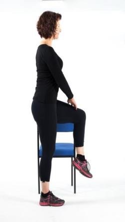 Woman demonstrating knee lift
