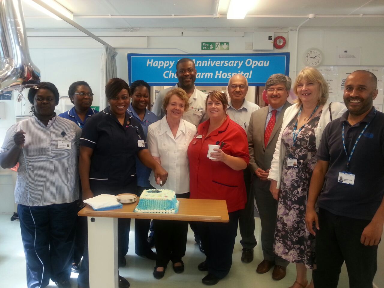 Staff celebrate the first birthday of the OPAU