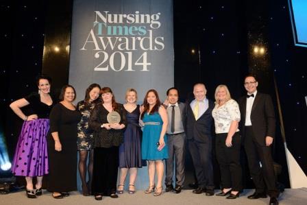 The infection control team pose with their award.