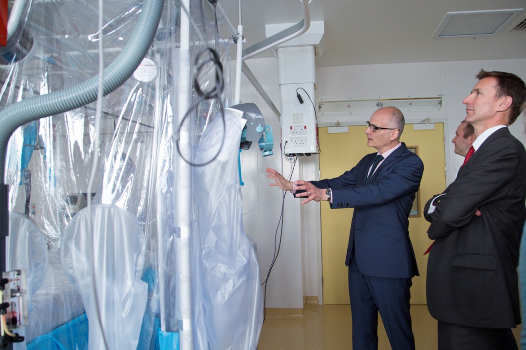 Health Secretary Jeremy Hunt and Dr Michael Jacobs, infectious disease consultant