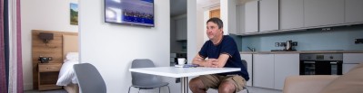 Man sitting at table in the Pears Building